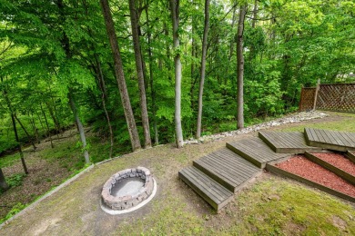 Nestled in a quiet cul-de-sac, this beautifully updated on Point O Woods Country Club in Michigan - for sale on GolfHomes.com, golf home, golf lot