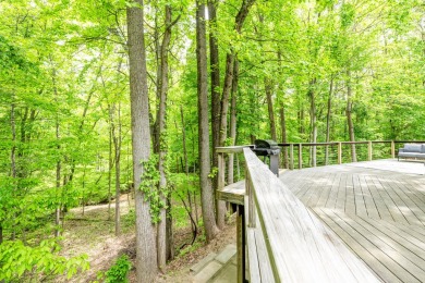 Nestled in a quiet cul-de-sac, this beautifully updated on Point O Woods Country Club in Michigan - for sale on GolfHomes.com, golf home, golf lot