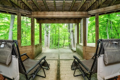Nestled in a quiet cul-de-sac, this beautifully updated on Point O Woods Country Club in Michigan - for sale on GolfHomes.com, golf home, golf lot