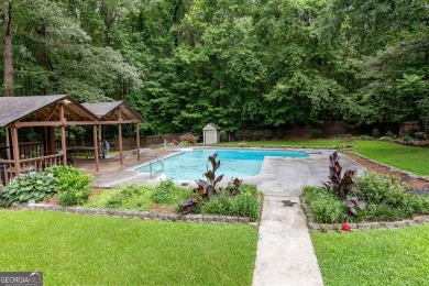 Tucked away at the end of a quiet cul-de-sac, this beautiful 3 on Braelinn Golf Club in Georgia - for sale on GolfHomes.com, golf home, golf lot