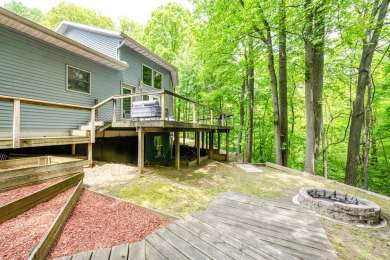 Nestled in a quiet cul-de-sac, this beautifully updated on Point O Woods Country Club in Michigan - for sale on GolfHomes.com, golf home, golf lot
