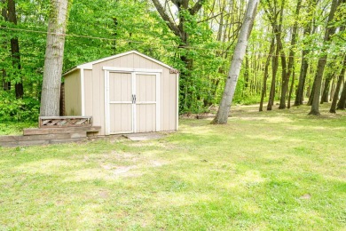 Nestled in a quiet cul-de-sac, this beautifully updated on Point O Woods Country Club in Michigan - for sale on GolfHomes.com, golf home, golf lot