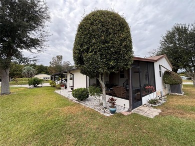 Welcome to this desirable split-bedroom home in the gated on Zellwood Station Country Club in Florida - for sale on GolfHomes.com, golf home, golf lot