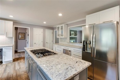 Welcome to this beautifully updated two-story home in the heart on Dunwoody Country Club in Georgia - for sale on GolfHomes.com, golf home, golf lot