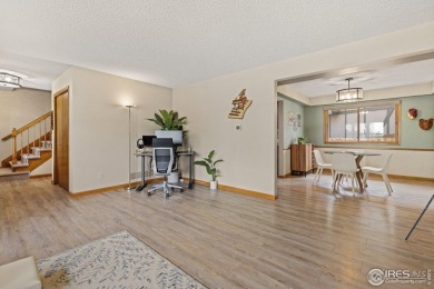 From the moment you arrive in the ever-popular Golden Meadows on Collindale Golf Course in Colorado - for sale on GolfHomes.com, golf home, golf lot