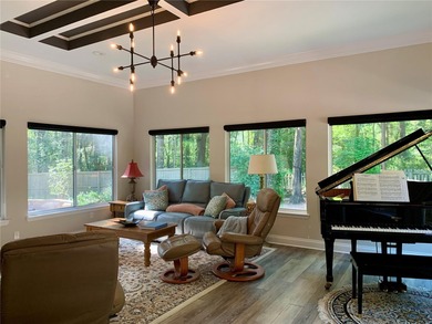 Discover refined elegance in this completely updated on Haile Plantation Golf and Country Club in Florida - for sale on GolfHomes.com, golf home, golf lot