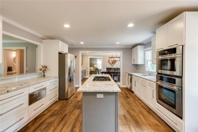 Welcome to this beautifully updated two-story home in the heart on Dunwoody Country Club in Georgia - for sale on GolfHomes.com, golf home, golf lot