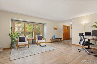 From the moment you arrive in the ever-popular Golden Meadows on Collindale Golf Course in Colorado - for sale on GolfHomes.com, golf home, golf lot