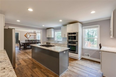 Welcome to this beautifully updated two-story home in the heart on Dunwoody Country Club in Georgia - for sale on GolfHomes.com, golf home, golf lot