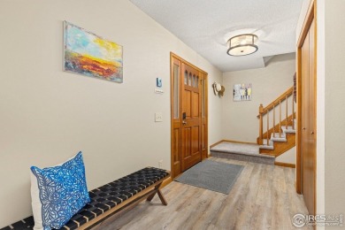 From the moment you arrive in the ever-popular Golden Meadows on Collindale Golf Course in Colorado - for sale on GolfHomes.com, golf home, golf lot