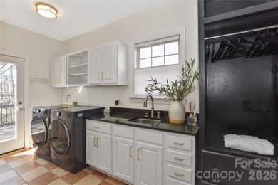 Welcome to this spacious and beautifully updated all brick home on Highland Creek Golf Club in North Carolina - for sale on GolfHomes.com, golf home, golf lot