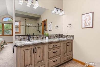 From the moment you arrive in the ever-popular Golden Meadows on Collindale Golf Course in Colorado - for sale on GolfHomes.com, golf home, golf lot