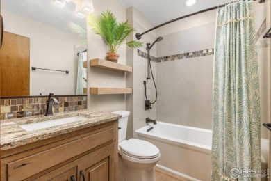 From the moment you arrive in the ever-popular Golden Meadows on Collindale Golf Course in Colorado - for sale on GolfHomes.com, golf home, golf lot