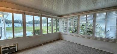 Stunning 3 bedroom 2 bath home in 55,+ Resort style community in on Zephyrhills Municipal Golf Course in Florida - for sale on GolfHomes.com, golf home, golf lot