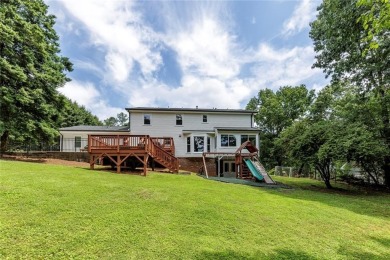 Welcome to this beautifully updated two-story home in the heart on Dunwoody Country Club in Georgia - for sale on GolfHomes.com, golf home, golf lot