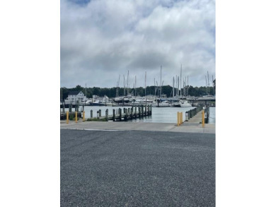 Beautiful homesite on the pond in Marina Village East. Just on on Bay Creek Golf Club in Virginia - for sale on GolfHomes.com, golf home, golf lot