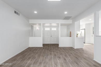 Coming soon- this beautifully remodeled home with an open floor on Sun City Lakes West and East in Arizona - for sale on GolfHomes.com, golf home, golf lot