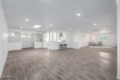 Coming soon- this beautifully remodeled home with an open floor on Sun City Lakes West and East in Arizona - for sale on GolfHomes.com, golf home, golf lot