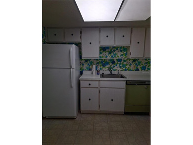 Come see this GROUND FLOOR condominium with Golf Course AND Lake on Country Club At Silver Springs Shores in Florida - for sale on GolfHomes.com, golf home, golf lot