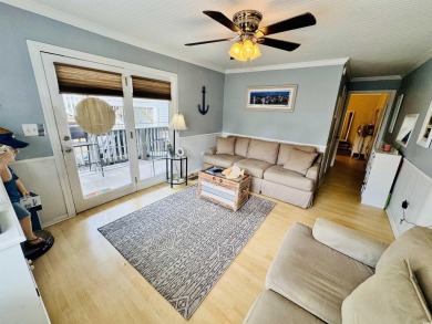 ADORABLE 2 BED/1.5 BATH BEACH HOUSE WITH WRAPAROUND COMPOSITE on Prestwick Country Club in South Carolina - for sale on GolfHomes.com, golf home, golf lot