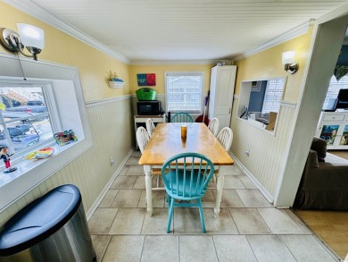 ADORABLE 2 BED/1.5 BATH BEACH HOUSE WITH WRAPAROUND COMPOSITE on Prestwick Country Club in South Carolina - for sale on GolfHomes.com, golf home, golf lot