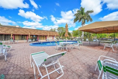 Welcome to Sunrise Lakes Phase 4, a charming and serene over 55 on Sunrise Lakes Phase IV Golf Course in Florida - for sale on GolfHomes.com, golf home, golf lot