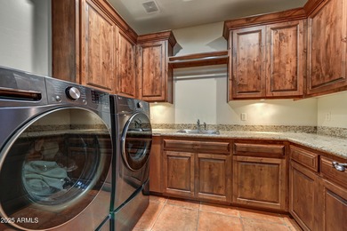 This exceptional custom-built residence located in Legend Trail on Legend Trail Golf Club in Arizona - for sale on GolfHomes.com, golf home, golf lot