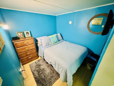 ADORABLE 2 BED/1.5 BATH BEACH HOUSE WITH WRAPAROUND COMPOSITE on Prestwick Country Club in South Carolina - for sale on GolfHomes.com, golf home, golf lot