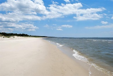 Enjoy peaceful coastal living in the Hollies neighborhood of Bay on Bay Creek Golf Club in Virginia - for sale on GolfHomes.com, golf home, golf lot