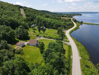 Welcome to your dream home, a charming 1.5-story house on Dundee Resort and Golf Club in  - for sale on GolfHomes.com, golf home, golf lot