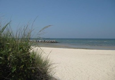 Enjoy peaceful coastal living in the Hollies neighborhood of Bay on Bay Creek Golf Club in Virginia - for sale on GolfHomes.com, golf home, golf lot