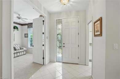 This 2-bedroom plus den villa offers sweeping golf course views on Estero Country Club in Florida - for sale on GolfHomes.com, golf home, golf lot