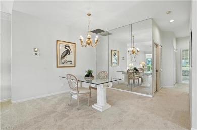 This 2-bedroom plus den villa offers sweeping golf course views on Estero Country Club in Florida - for sale on GolfHomes.com, golf home, golf lot
