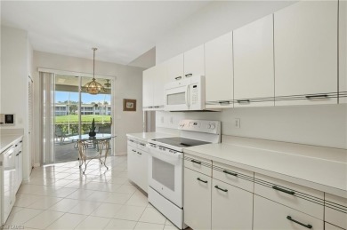This 2-bedroom plus den villa offers sweeping golf course views on Estero Country Club in Florida - for sale on GolfHomes.com, golf home, golf lot