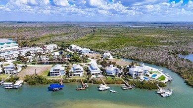 Under contract-accepting backup offers. Waterfront lot in the on Coral Creek Club in Florida - for sale on GolfHomes.com, golf home, golf lot