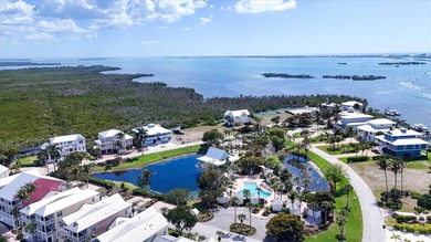Under contract-accepting backup offers. Waterfront lot in the on Coral Creek Club in Florida - for sale on GolfHomes.com, golf home, golf lot