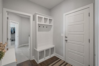 Stunning reverse 1.5-story home filled with natural light from on Shawnee Golf and Country Club in Kansas - for sale on GolfHomes.com, golf home, golf lot