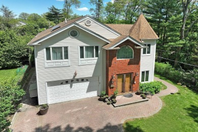 Elegant Colonial tucked away on a quiet cul-de-sac, this on Garden City Golf Club in New York - for sale on GolfHomes.com, golf home, golf lot
