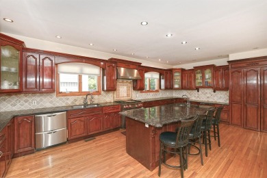 Elegant Colonial tucked away on a quiet cul-de-sac, this on Garden City Golf Club in New York - for sale on GolfHomes.com, golf home, golf lot