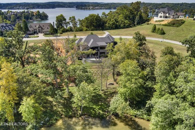 Exceptional Lakefront Living in WindRiver Golf & Country Club on Wind River Golf Course in Tennessee - for sale on GolfHomes.com, golf home, golf lot