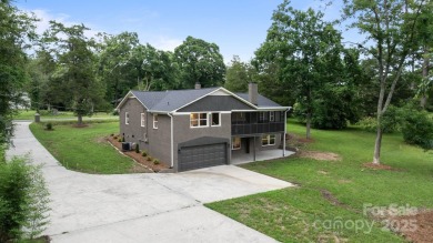 Experience Rock Hill Country Club golf course living in this on Rock Hill Country Club in South Carolina - for sale on GolfHomes.com, golf home, golf lot