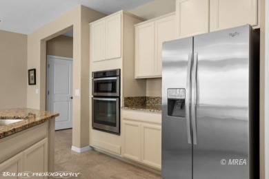 This delightful single-level 2-bedroom, 2-bathroom home is on Conestoga Golf Club in Nevada - for sale on GolfHomes.com, golf home, golf lot
