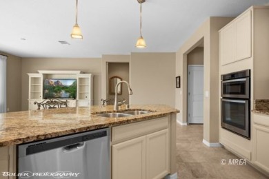 This delightful single-level 2-bedroom, 2-bathroom home is on Conestoga Golf Club in Nevada - for sale on GolfHomes.com, golf home, golf lot