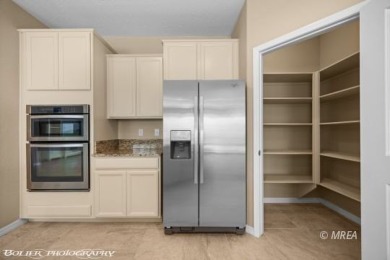 This delightful single-level 2-bedroom, 2-bathroom home is on Conestoga Golf Club in Nevada - for sale on GolfHomes.com, golf home, golf lot