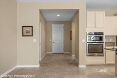 This delightful single-level 2-bedroom, 2-bathroom home is on Conestoga Golf Club in Nevada - for sale on GolfHomes.com, golf home, golf lot