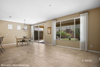 This delightful single-level 2-bedroom, 2-bathroom home is on Conestoga Golf Club in Nevada - for sale on GolfHomes.com, golf home, golf lot
