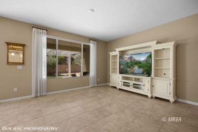 This delightful single-level 2-bedroom, 2-bathroom home is on Conestoga Golf Club in Nevada - for sale on GolfHomes.com, golf home, golf lot