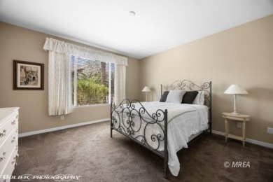 This delightful single-level 2-bedroom, 2-bathroom home is on Conestoga Golf Club in Nevada - for sale on GolfHomes.com, golf home, golf lot