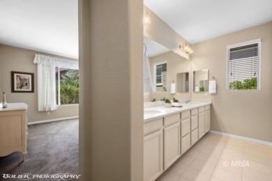 This delightful single-level 2-bedroom, 2-bathroom home is on Conestoga Golf Club in Nevada - for sale on GolfHomes.com, golf home, golf lot