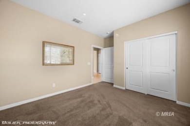 This delightful single-level 2-bedroom, 2-bathroom home is on Conestoga Golf Club in Nevada - for sale on GolfHomes.com, golf home, golf lot